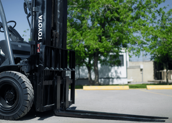 Forklift wear parts inspected by a technician